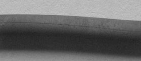 圖7-5 ML35鋼絲材表面拉痕缺陷